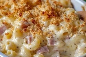 Delicious Chicken Cordon Bleu Casserole topped with melted cheese and herbs