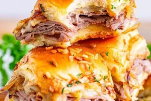 French Dip Sliders served with au jus for dipping