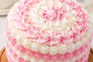 Slice of Pink Velvet Swirl Cake showcasing its vibrant color and creamy texture