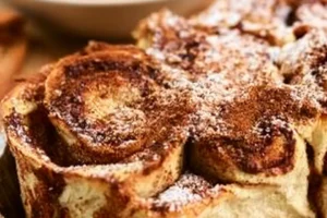 Slice of protein-packed cinnamon swirl cake on a plate
