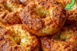 Homemade protein-packed cottage cheese bagels on a wooden board