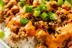 Spicy Bang Bang Turkey Rice Bowls with ground turkey, rice, and sauce