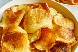 Homemade air fryer potato chips served in a bowl