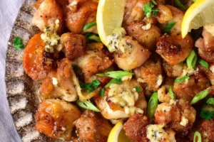 Crispy garlic butter air fryer chicken bites served on a plate