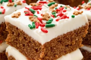 Delicious gingerbread cookie squares topped with icing and festive decorations