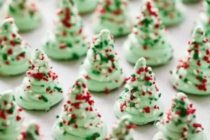 Sparkling Christmas tree meringues decorated for the holiday season