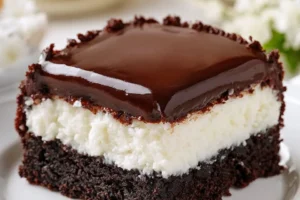 Delicious Mounds Brownies topped with chocolate and coconut in a dessert platter.