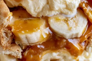 No-Bake Banana Pudding Tiramisu dessert beautifully layered in a glass dish